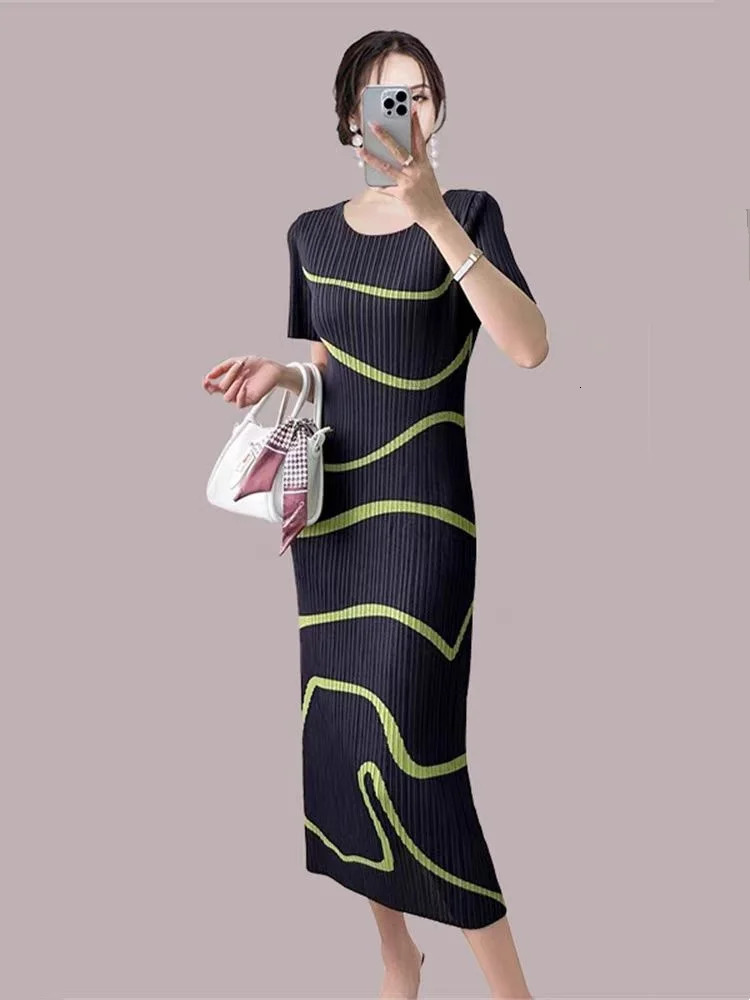 MIYAKE pleated dress irregular stripes Japanese n elegant casual loose short sleeved long skirt summer 2024 item 250324