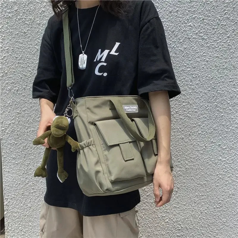 Waterproof shoulder bag womens multi pocket nylon messenger prefabricated canvas handbag 250326
