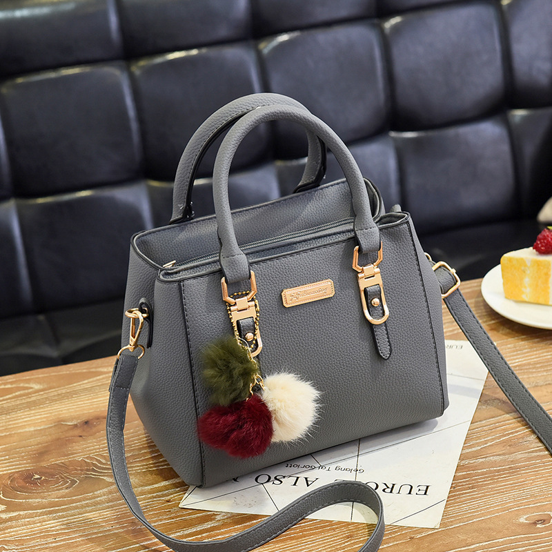 Bag women's new fashion single shoulder small bag double large capacity hairball hand oblique span women's bag 2025