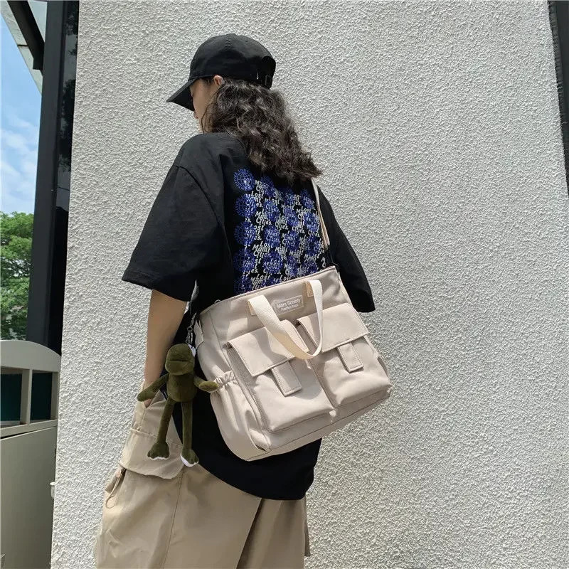 Waterproof shoulder bag womens multi pocket nylon messenger prefabricated canvas handbag 250326