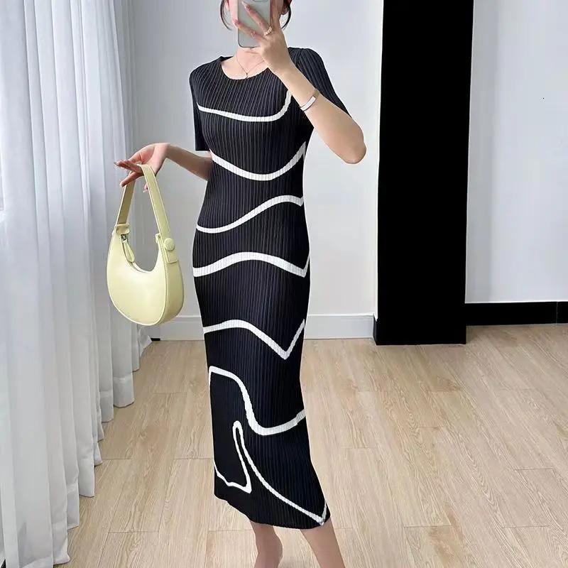 MIYAKE pleated dress irregular stripes Japanese n elegant casual loose short sleeved long skirt summer 2024 item 250324