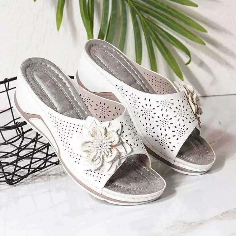 2025 Summer New Women's Slippers Casual Shoes Hollow Designer Fashion Slope Heel Beach Shoes Outdoor Platform Comfortable Non slip Sandals