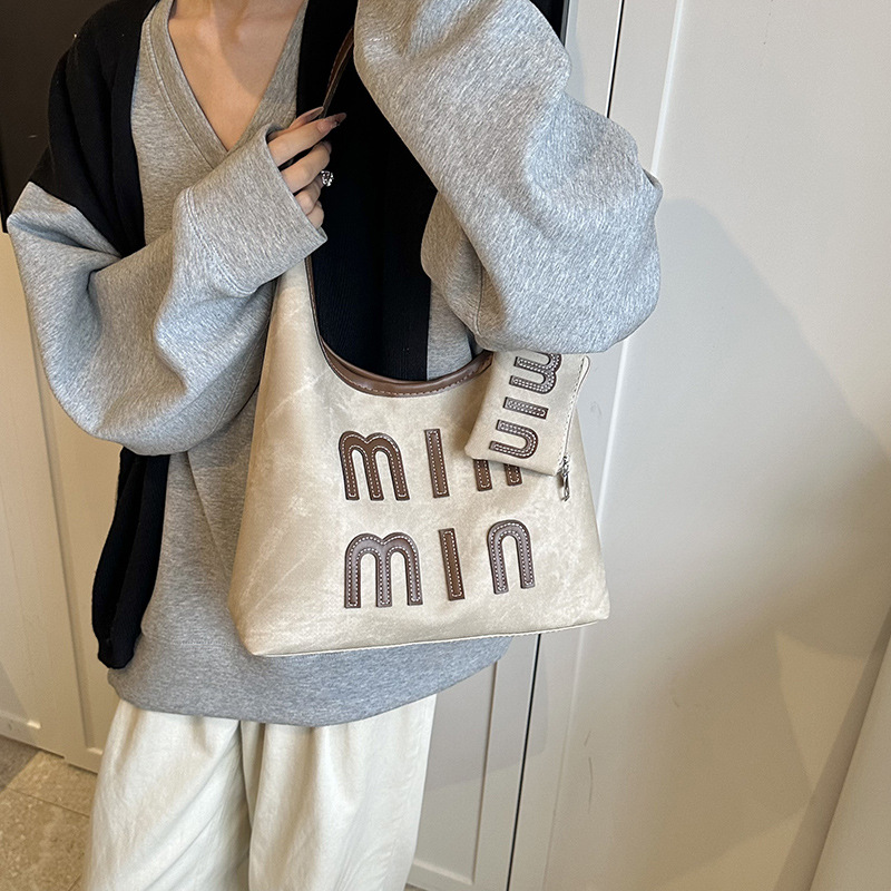 Casual retro large capacity bag women's new personality fashion single shoulder crossbody bag Tote bag 2025s hot