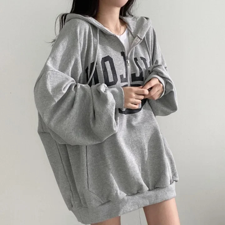 Korean Zip Up hooded sweatshirt womens loose fit slim mid length top Versatile spring and autumn jacket trendy cotton 250326