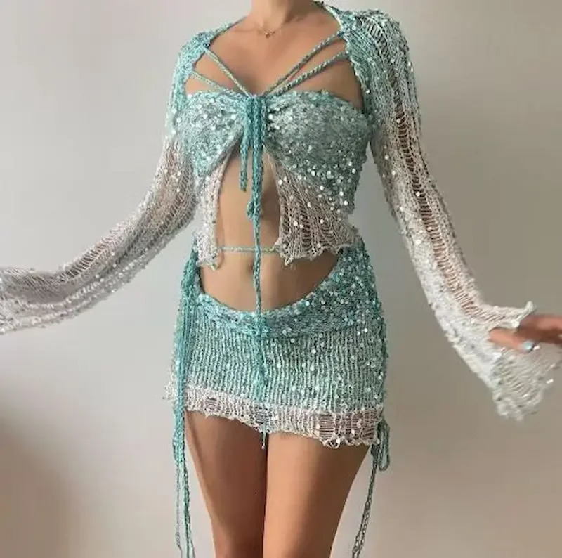Sexy sequin knitted hollow two-piece set womens long sleeved cut top mini skirt fashionable womens clothing 250326