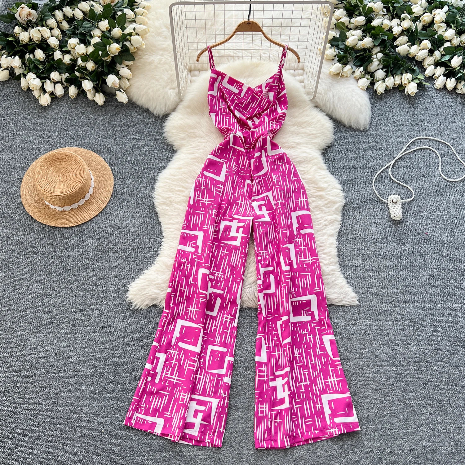 Casual full set spaghetti shoulder strap pocket printed swing collar sleeveless allows printing high waist wide leg loose jumpsuit 250326
