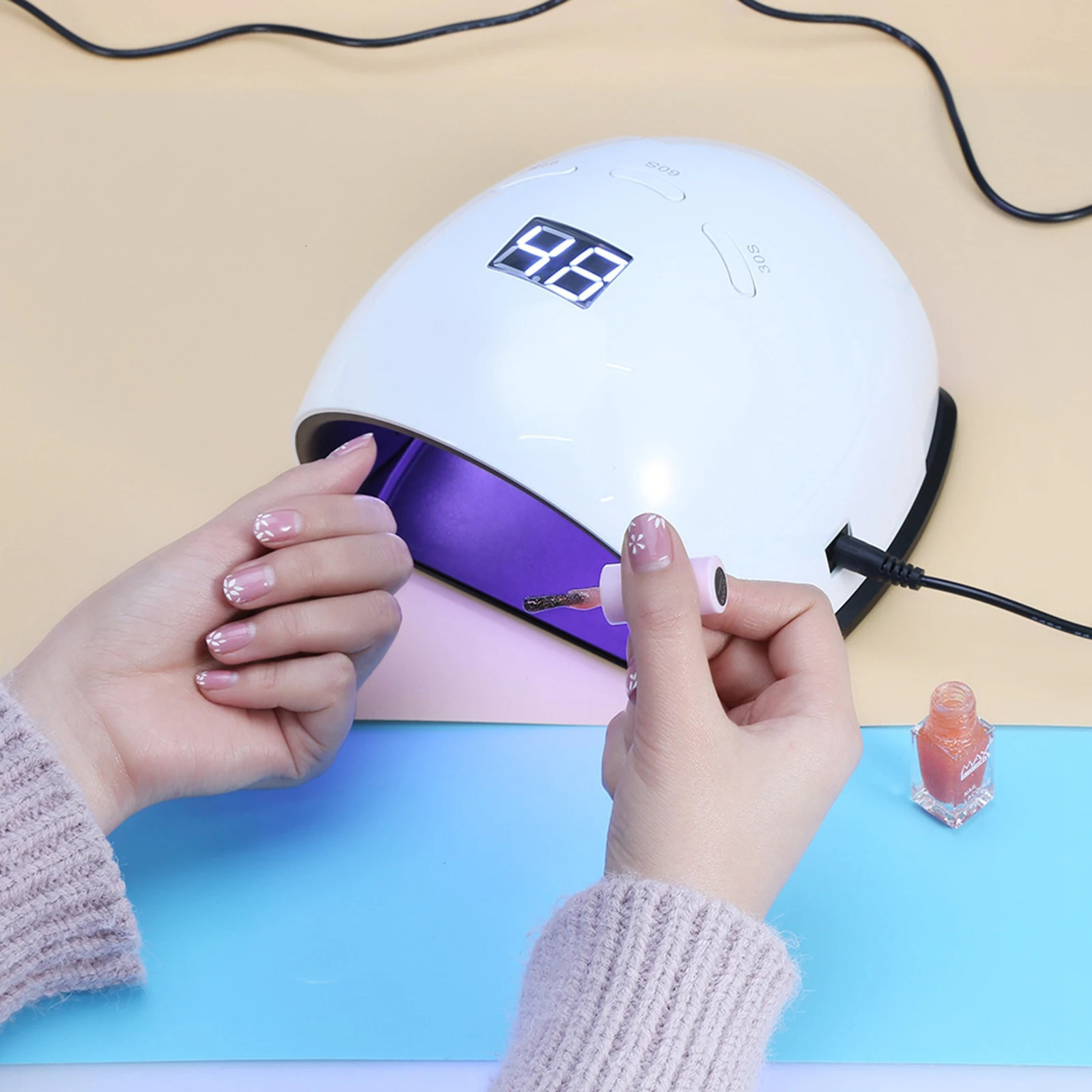 UVLED nail dryer lamp is used for polishing and curing of gel with intelligent sensor handle foot treatment tool 250325