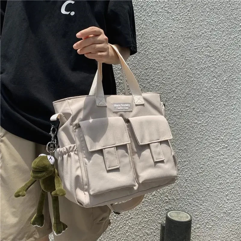 Waterproof shoulder bag womens multi pocket nylon messenger prefabricated canvas handbag 250326