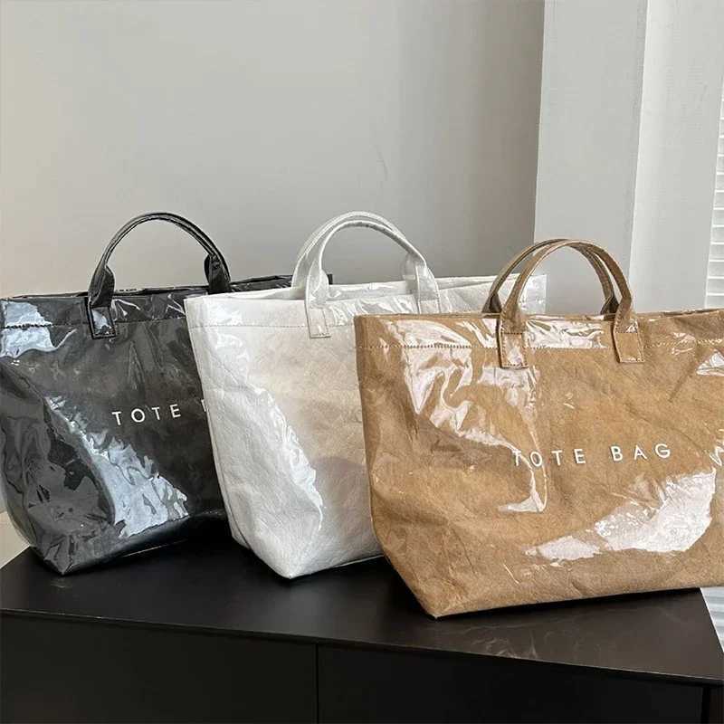 Solid color handbag PVC kraft paper large capacity homeless handbag womens casual shopping letter printed top handle handbag Z250328