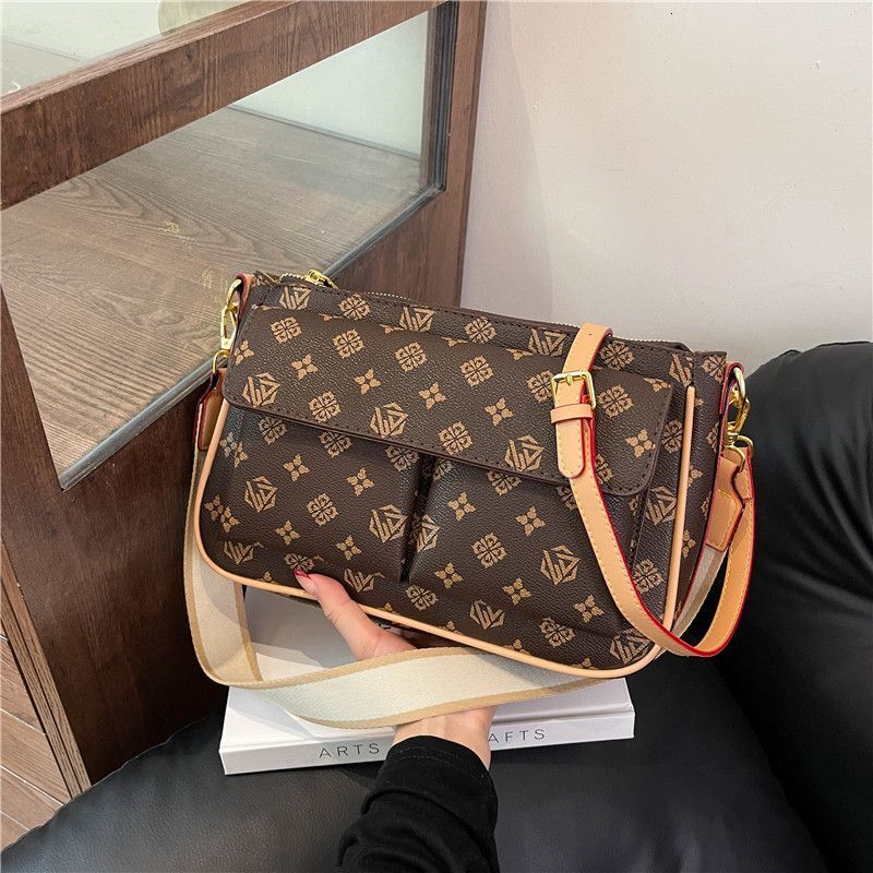 2025 New Light Luxury Women's Multi functional Old Flower Broadband Single Shoulder Underarm Patch French Designer Fashion Crossbody Bag
