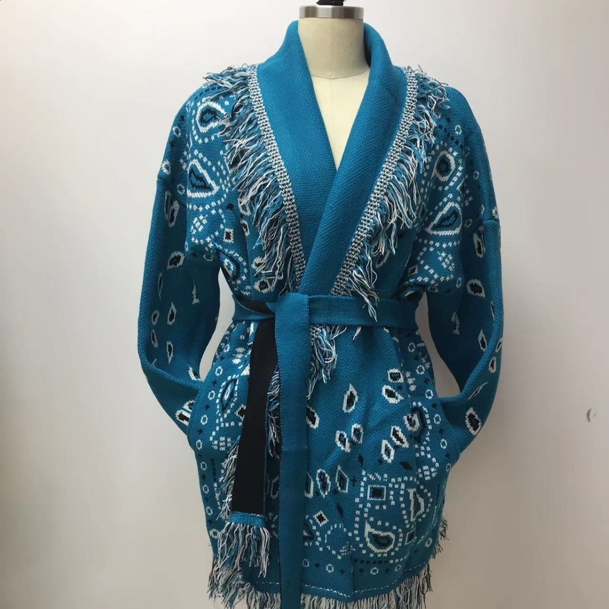 Autumn and winter thick tassel jacquard mid length cardigan womens loose color blocked lapel sweater jacket 230324