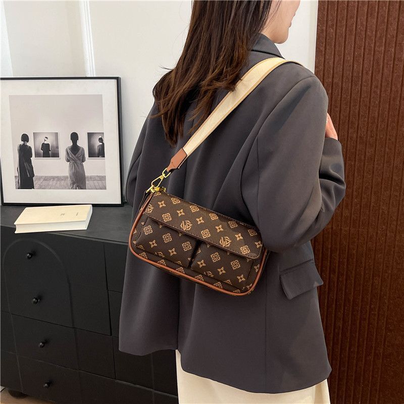 2025 New Light Luxury Women's Multi functional Old Flower Broadband Single Shoulder Underarm Patch French Designer Fashion Crossbody Bag