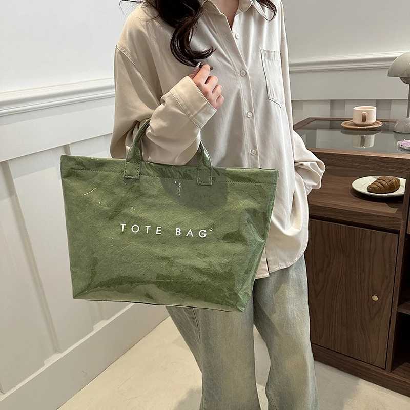 Solid color handbag PVC kraft paper large capacity homeless handbag womens casual shopping letter printed top handle handbag Z250328