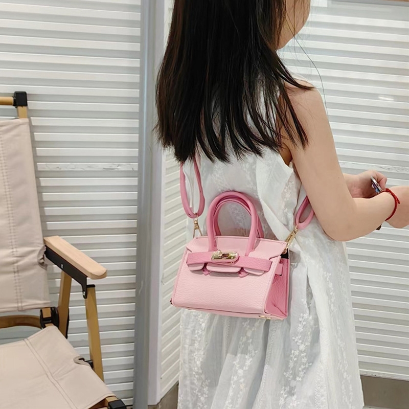 Hot sale of all the clash of your Kelly bag niche design foreign children's hand crossbody bag