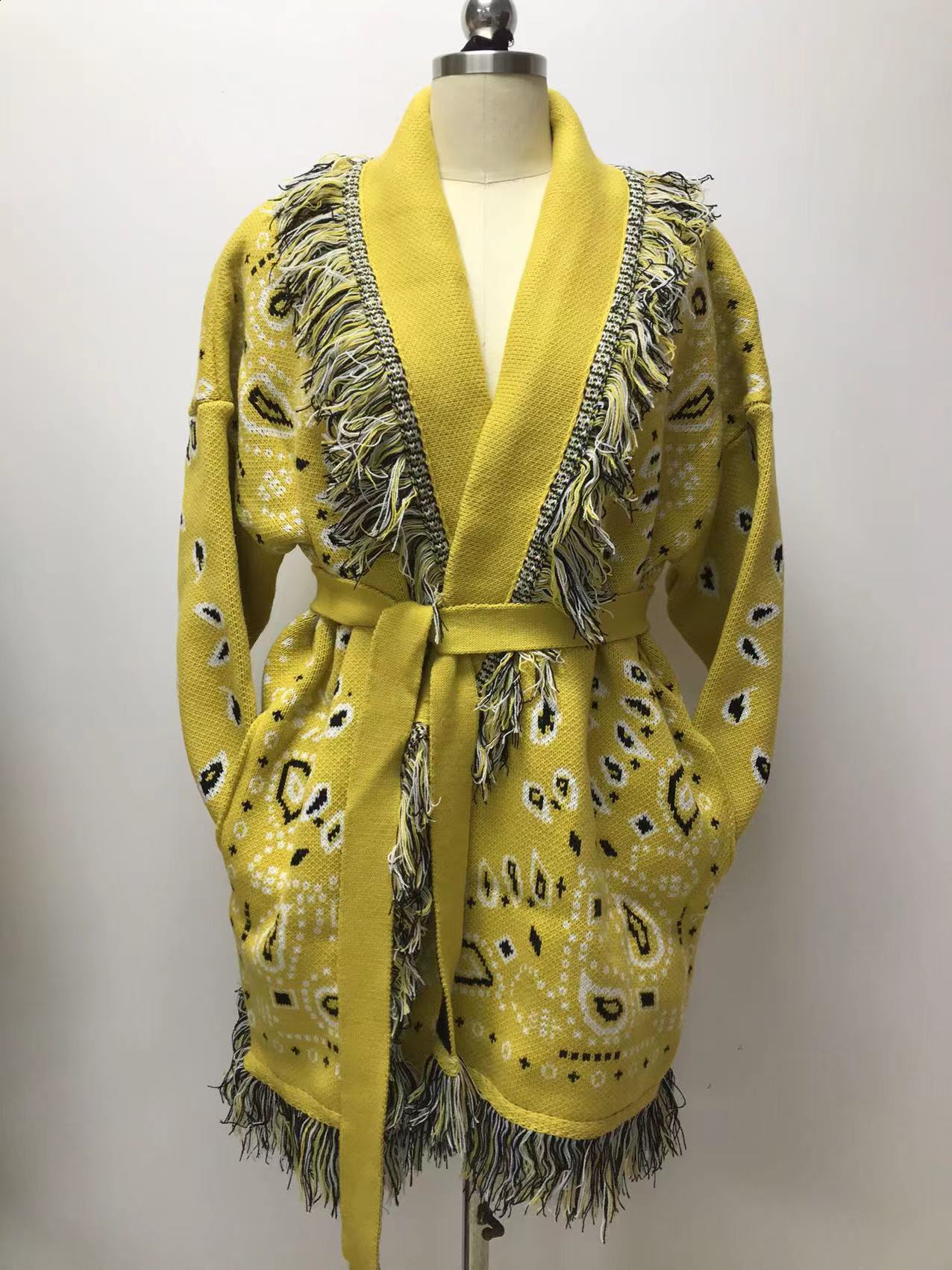 Autumn and winter thick tassel jacquard mid length cardigan womens loose color blocked lapel sweater jacket 230324