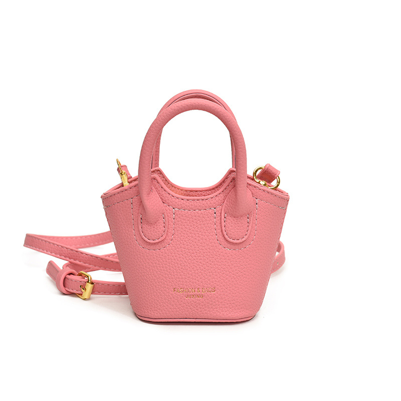 Hot selling solid color all-match lychee print PU girl crossbody carrying mini change lipstick accessory bucket bag