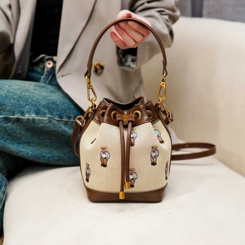 Designer bag Fashionable womens bucket bag bear embroidery Drstring design fashionable ten font wallet suitable for fashionable couples ideal Y250328