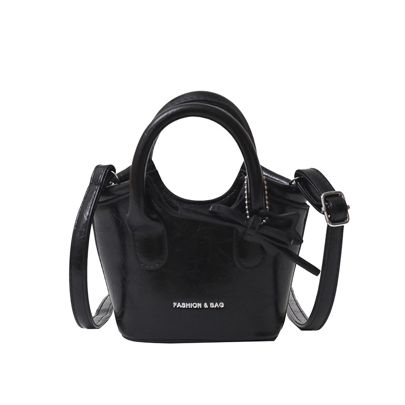 Cute bow mini hand bucket bag solid color all-match children's change satchel