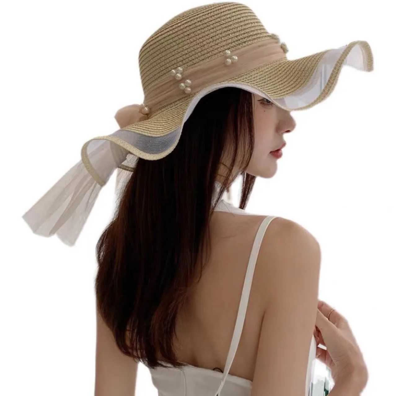 New Korean style womens straw hat joint bow ribbon big Brim sunset Ins celebrity outdoor fashion beach holiday glacier hatXJ250329