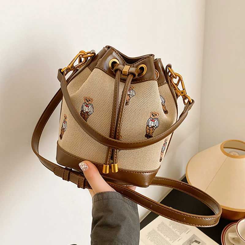 Designer bag Fashionable womens bucket bag bear embroidery Drstring design fashionable ten font wallet suitable for fashionable couples ideal Y250328