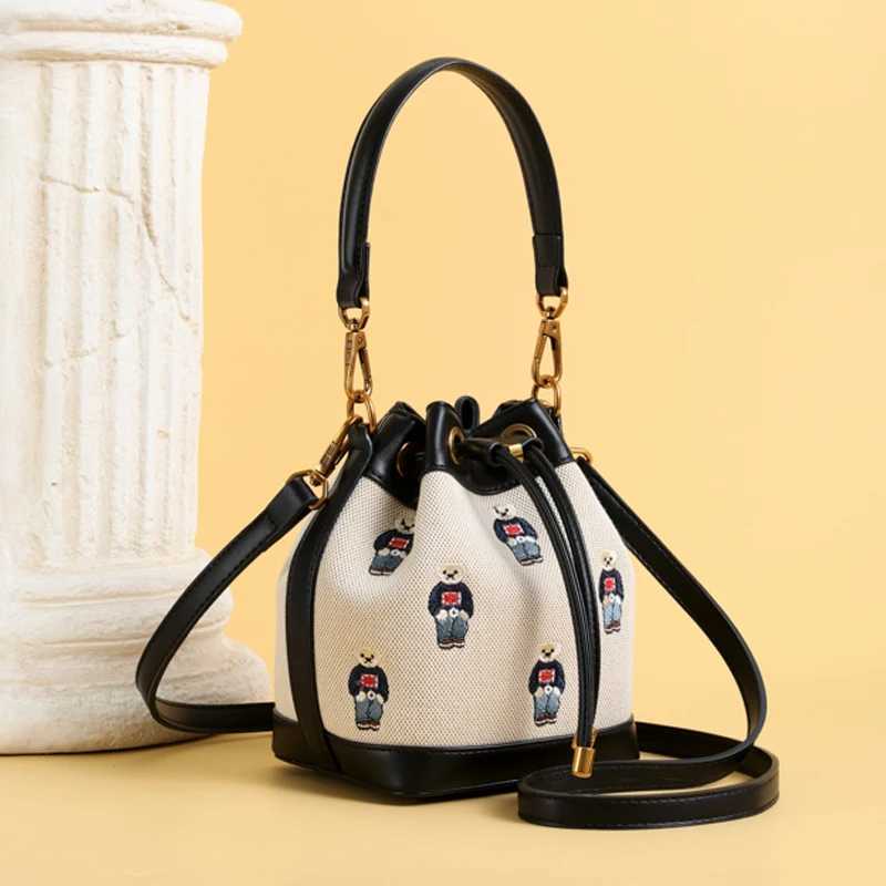 Designer bag Fashionable womens bucket bag bear embroidery Drstring design fashionable ten font wallet suitable for fashionable couples ideal Y250328