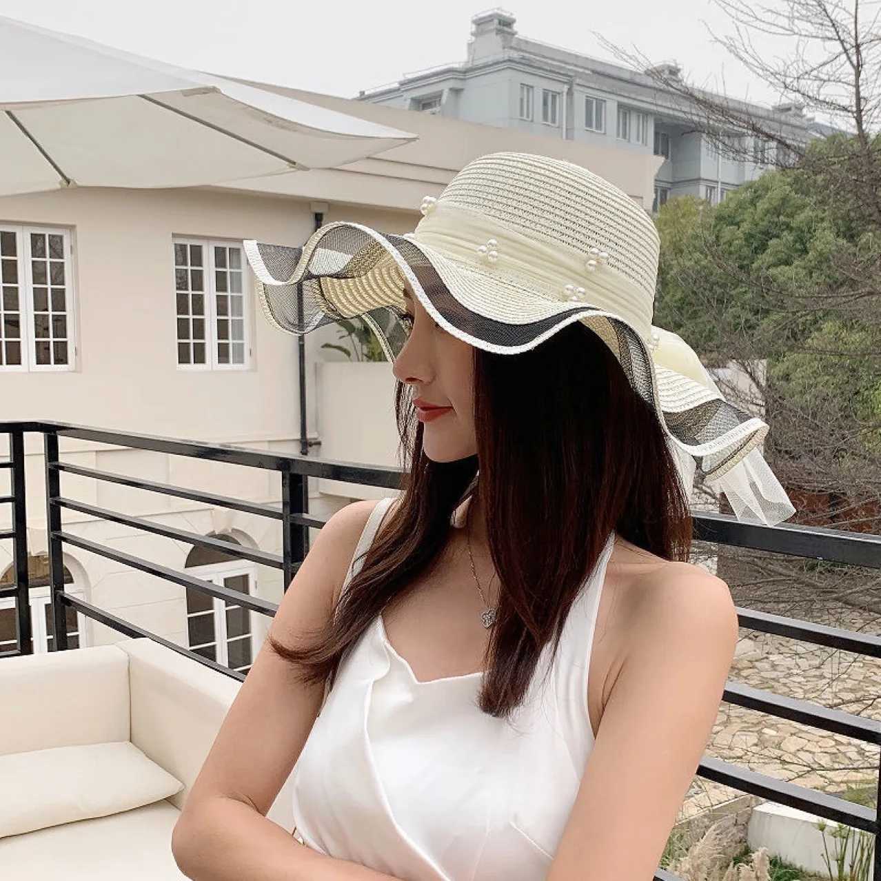 New Korean style womens straw hat joint bow ribbon big Brim sunset Ins celebrity outdoor fashion beach holiday glacier hatXJ250329