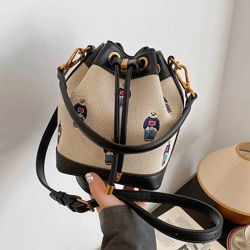 Designer bag Fashionable womens bucket bag bear embroidery Drstring design fashionable ten font wallet suitable for fashionable couples ideal Y250328