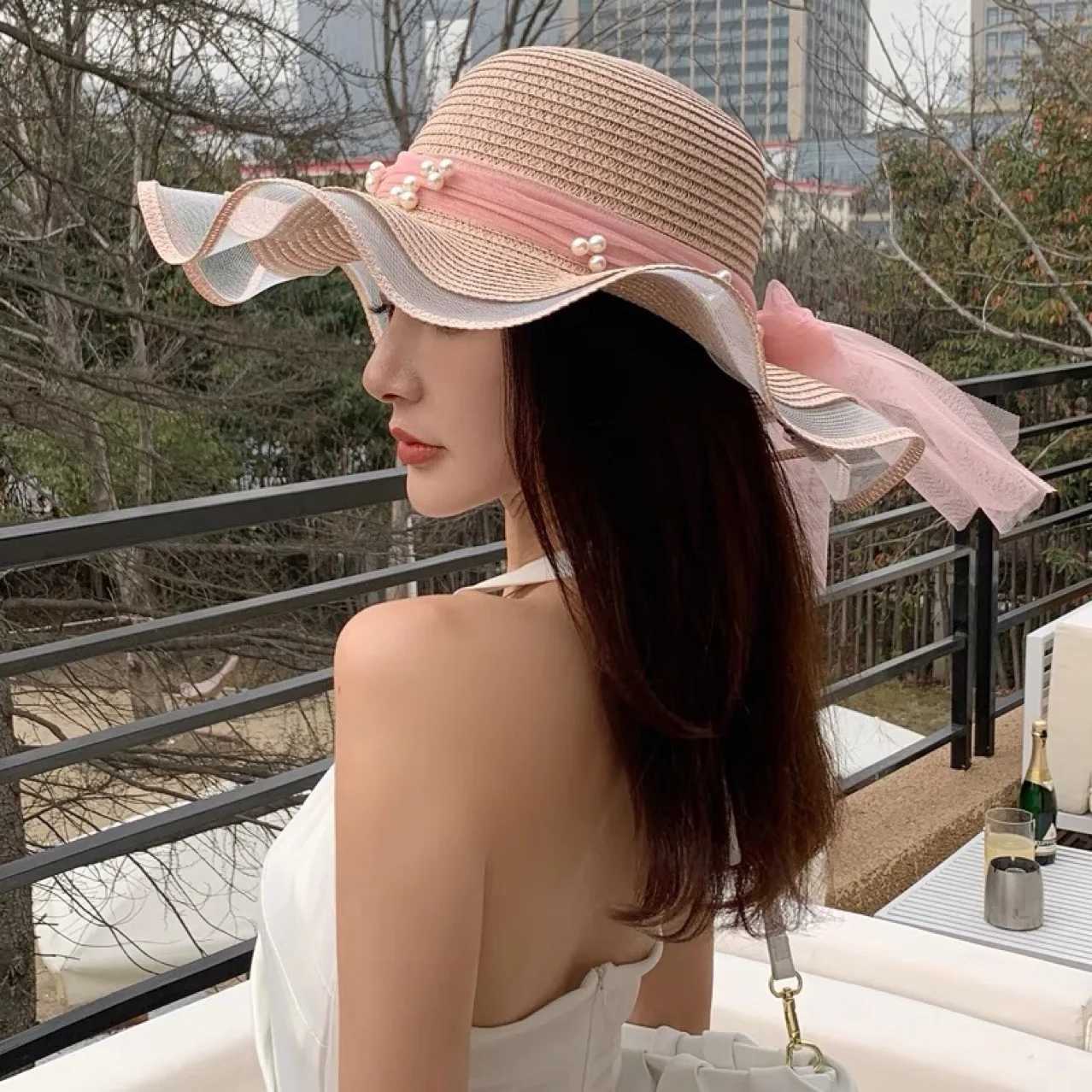 New Korean style womens straw hat joint bow ribbon big Brim sunset Ins celebrity outdoor fashion beach holiday glacier hatXJ250329