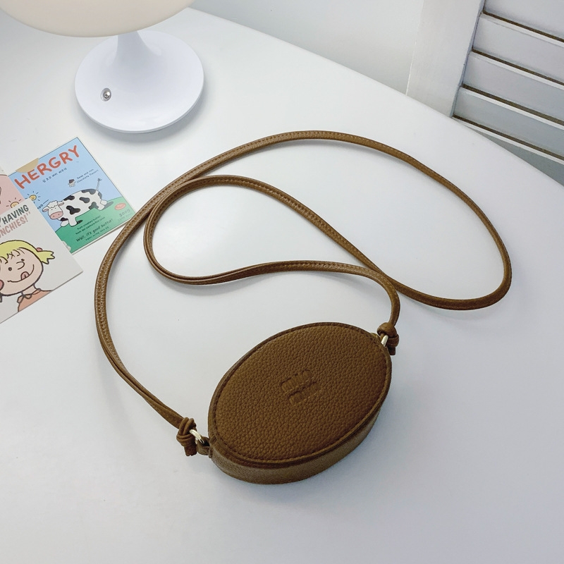 new stylish The 3 mini purse for girls is a simple solid color princess crossbody bag