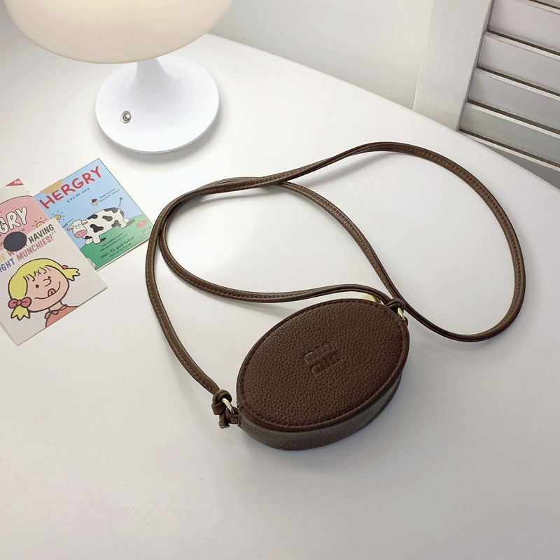new stylish The 3 mini purse for girls is a simple solid color princess crossbody bag