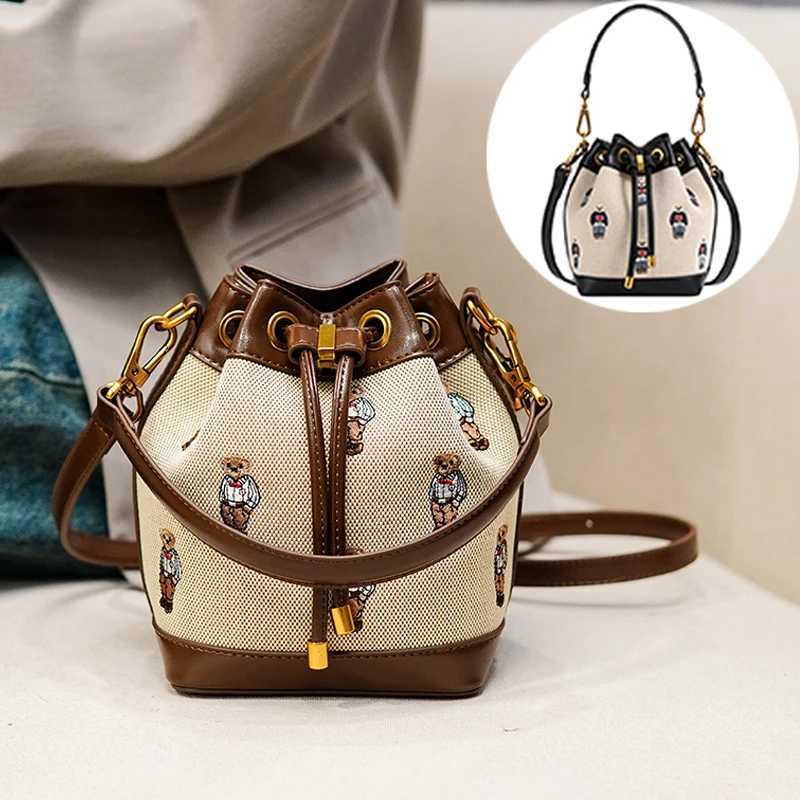 Designer bag Fashionable womens bucket bag bear embroidery Drstring design fashionable ten font wallet suitable for fashionable couples ideal Y250328