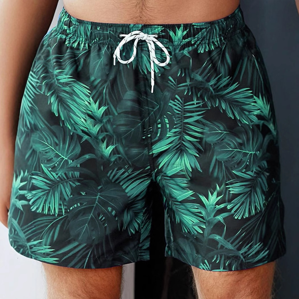 Top quality Brand High Quality New Style Free Delivery Designer Bag Beach vacation loose surfing shorts, plus size printed five quarter men's bea