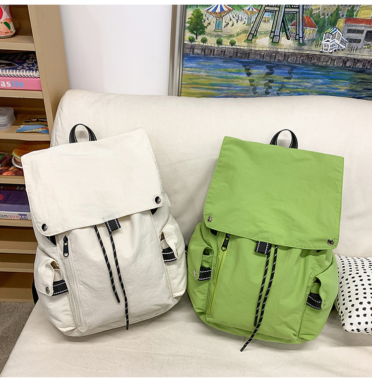 Free shipping solid color school bag female junior high school students light backpack college students leisure backpack