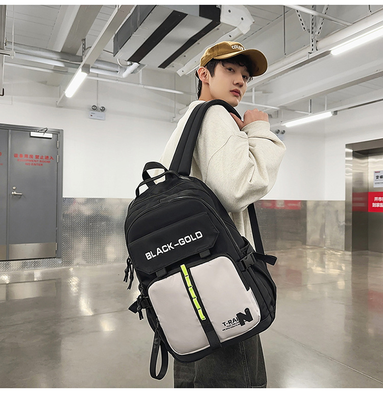 Backpack men and women large capacity middle school student bag light fashion college students fashionable cool travel backpack