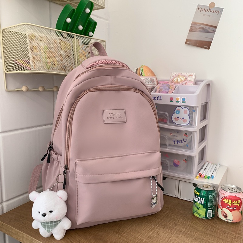 Simple schoolbag female college students junior high school girls solid color all-matching large capacity college backpack 2025
