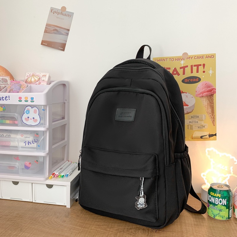 Simple schoolbag female college students junior high school girls solid color all-matching large capacity college backpack 2025