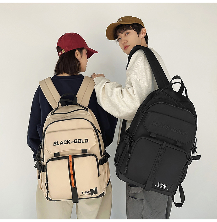 Backpack men and women large capacity middle school student bag light fashion college students fashionable cool travel backpack