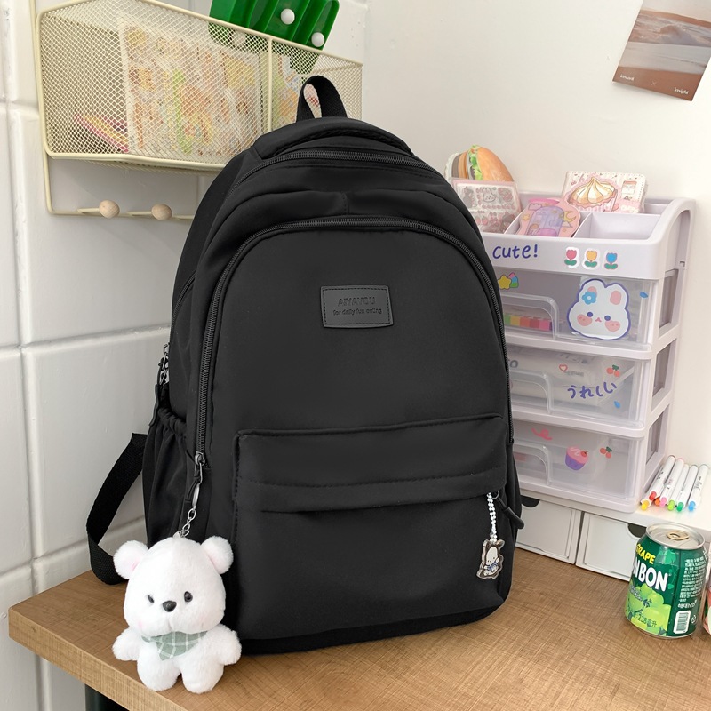 Simple schoolbag female college students junior high school girls solid color all-matching large capacity college backpack 2025