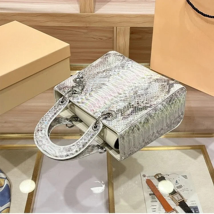 2025 New Designer Snake Pattern Women's Chain Shoulder Crossbody Fashion Leather Handbag Light High-end White Bag