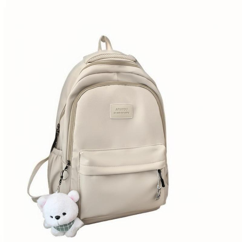 Simple schoolbag female college students junior high school girls solid color all-matching large capacity college backpack 2025