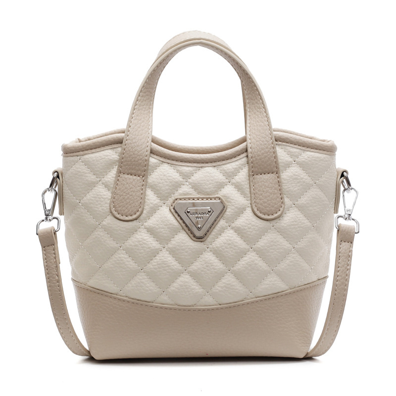 Designer free shipping new women's fashionable high-end texture dia grid bucket hand-held single shoulder crossbody bag