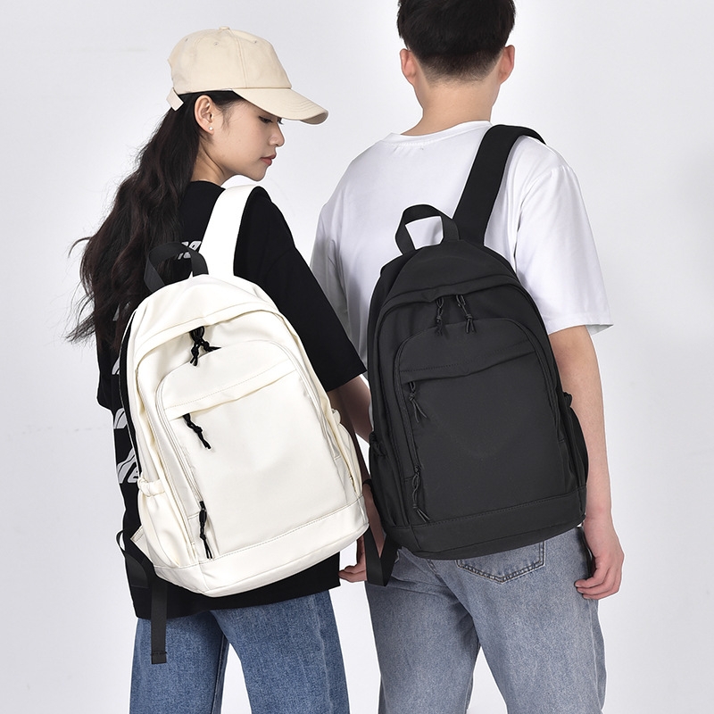 Free shipping hot new backpack 14 inch student backpack large capacity men and women through multi-layer space backpack