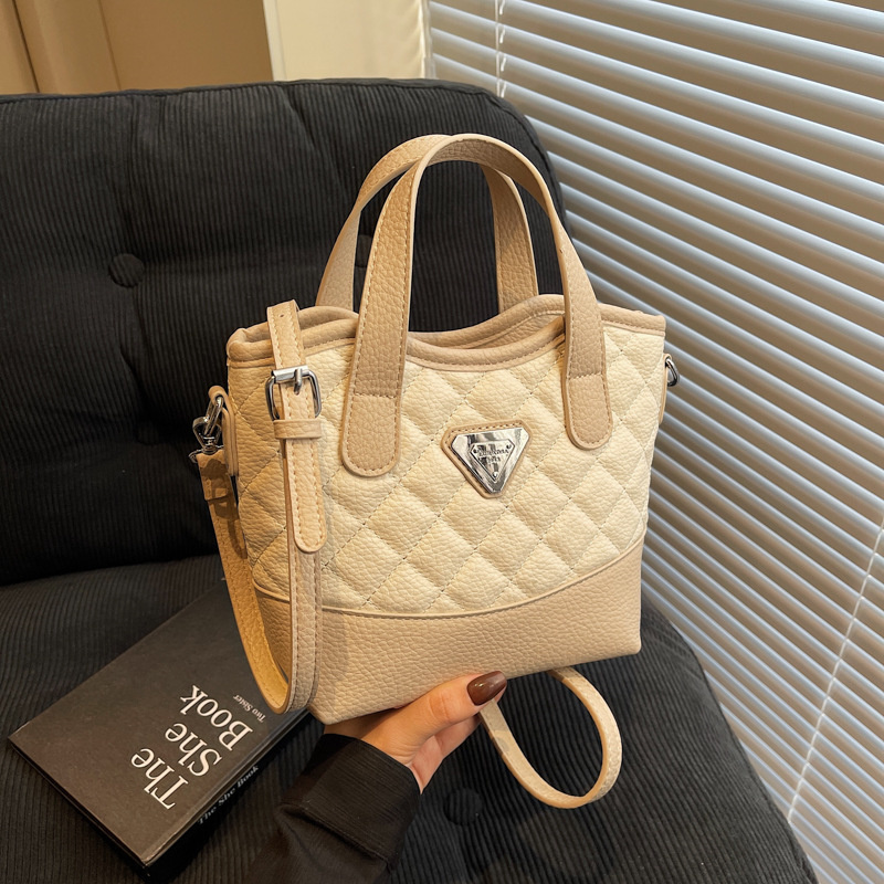 Designer free shipping new women's fashionable high-end texture dia grid bucket hand-held single shoulder crossbody bag