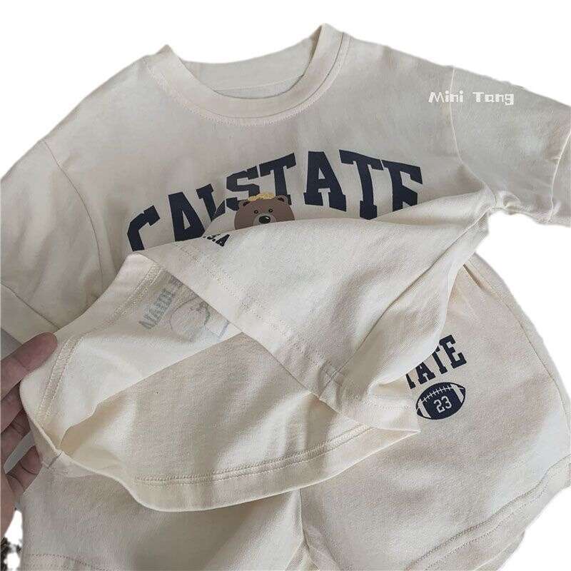 Korean New Children's Cartoon Cute Letter Short Sleeved T-Shirt Shorts Boys And Girls Two Piece Set For Thin Summer