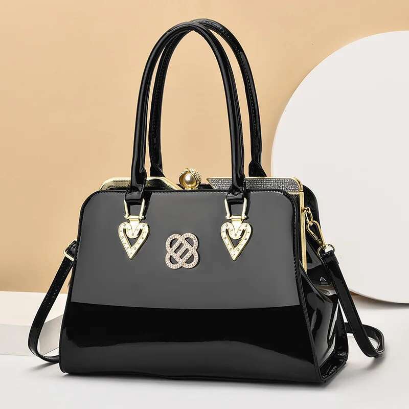 Spring and summer new patent leather metal buckle steel frame handbag banquet dress daily one-shoulder cross-body women's bag