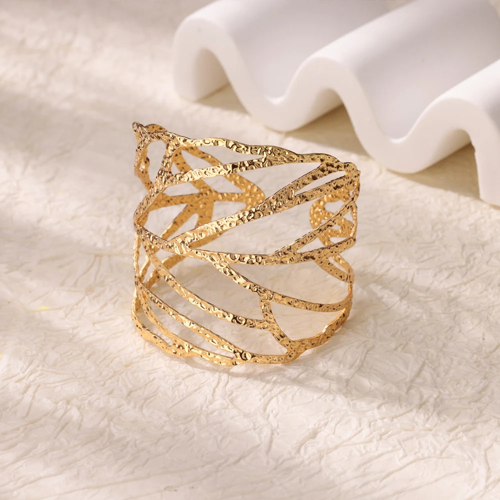 Stainless steel wide bracelet suitable for women gold flower leaf hollow cuff bracelet womens retro wedding jewelry gift 250425