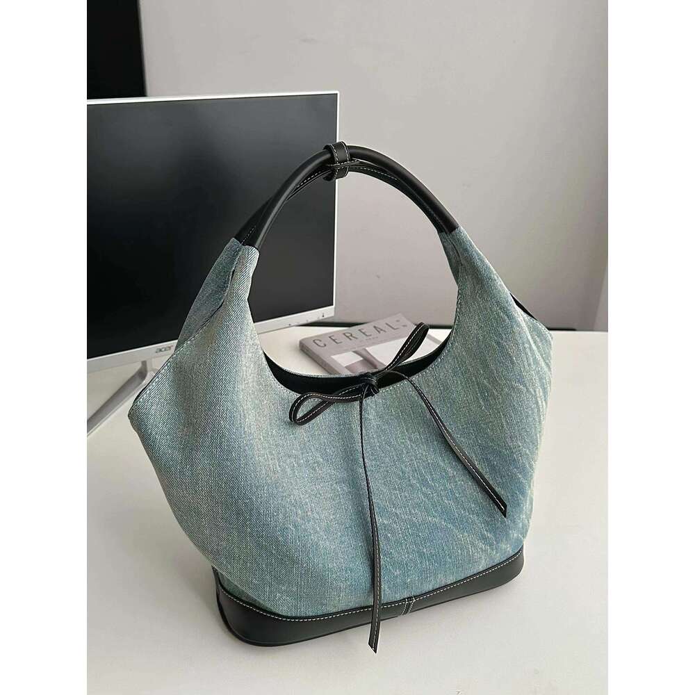 New niche design versatile canvas for women 2025 Korean splicing fashion handbag armpit tote bag