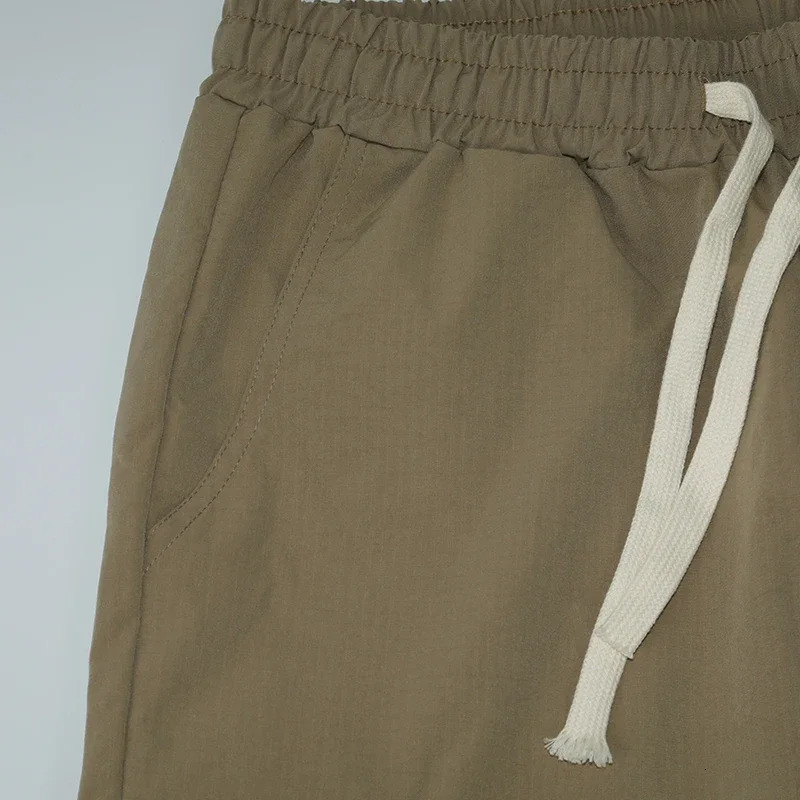 Summer mens loose leisure tactics slow jogging elastic waist multiple pockets cargo short distance running suitable for work and hiking 250425
