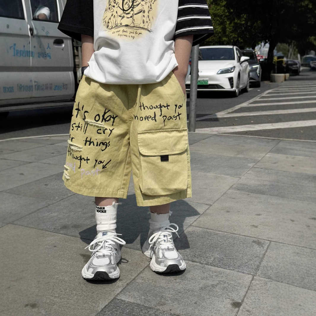 Childrens Pants Mens Summer Childrens Clothing Boys Shorts Thin Summer Workwear Pants Loose Korean Version Versatile Mens and Womens Pants Y250430MKS9
