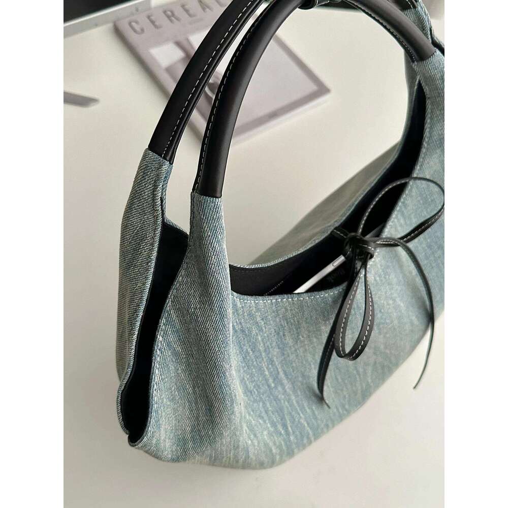 New niche design versatile canvas for women 2025 Korean splicing fashion handbag armpit tote bag